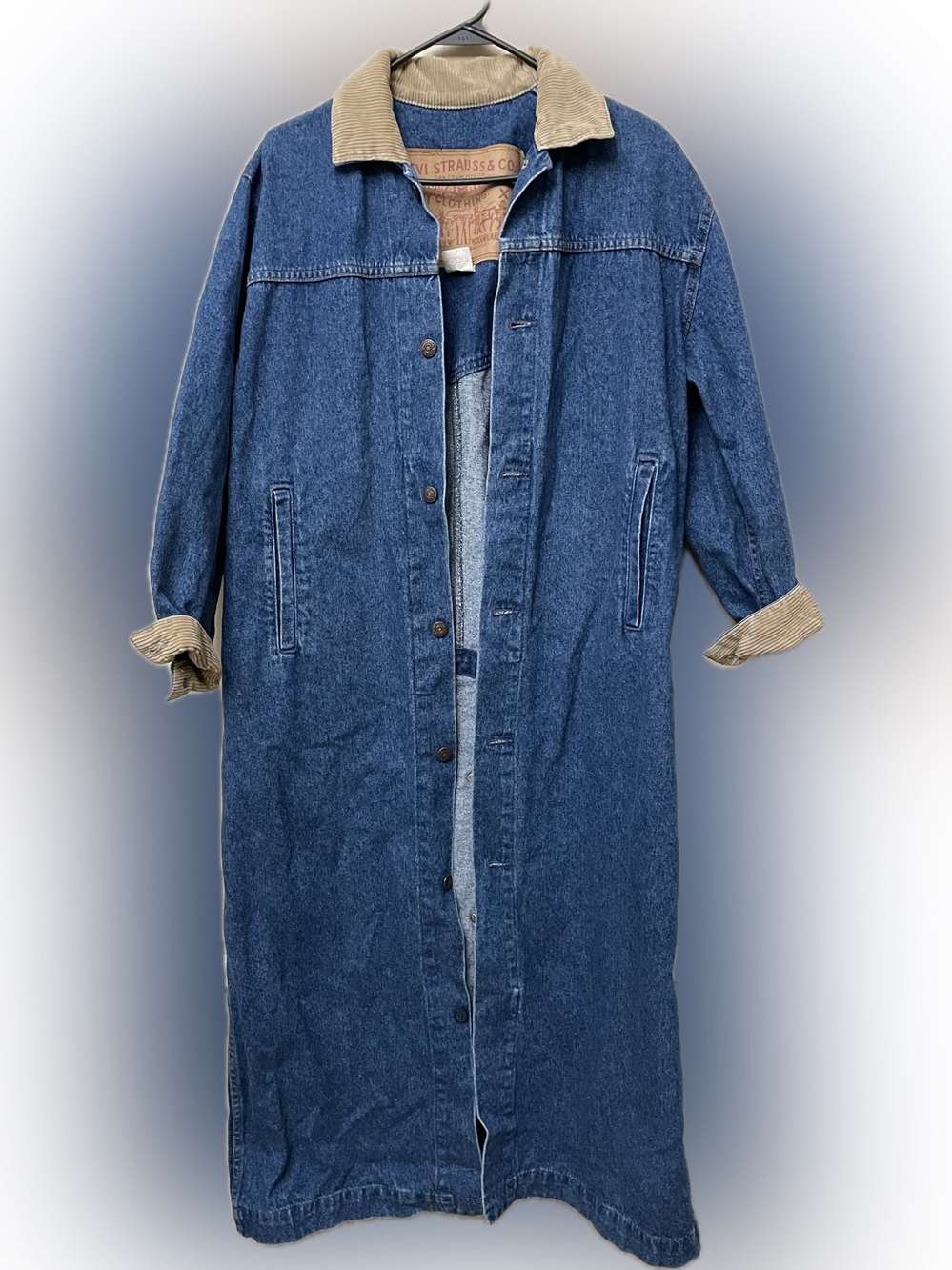 Vintage Levi's denim duster coat, 1980s or 1990s and featuring a corduroy collar